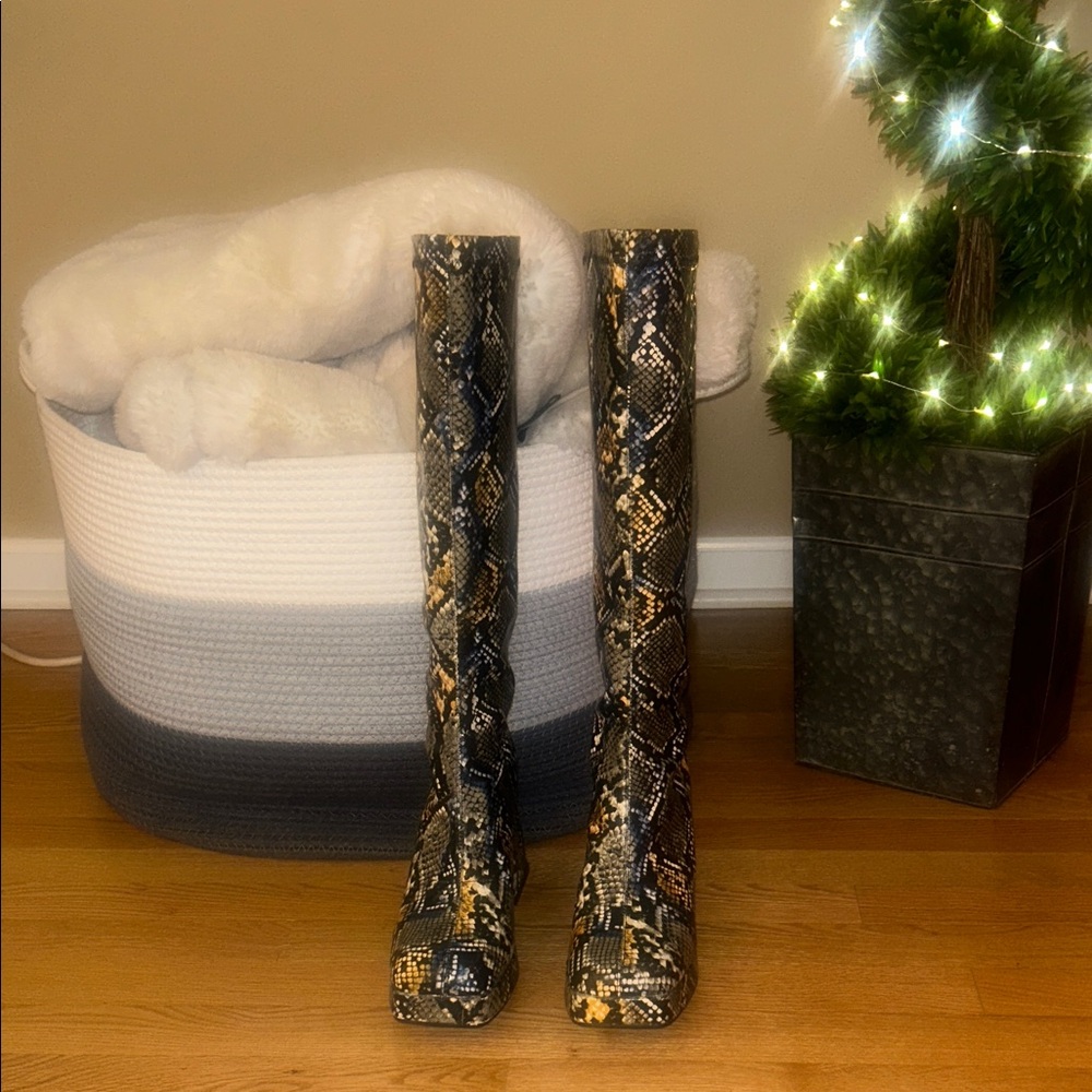 Elegant Snakeskin Heeled Boots